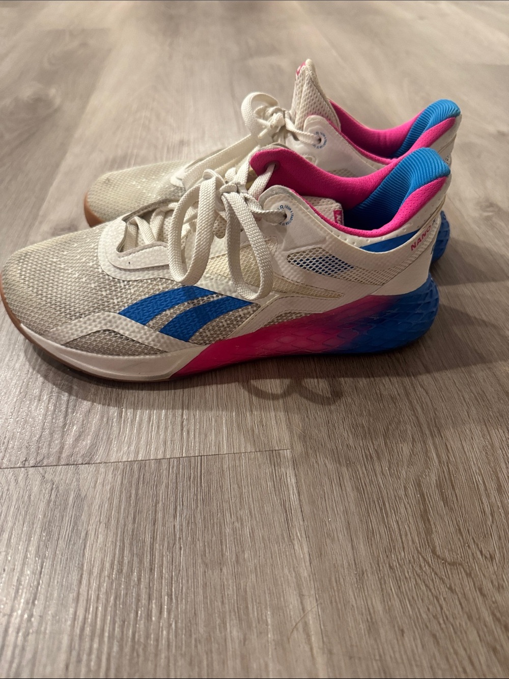 Reebok Nano X White Athletic Sneakers with Blue and Pink Accents